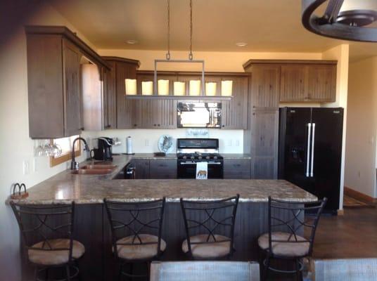 Knotty Alder Kitchen with Stone Finish