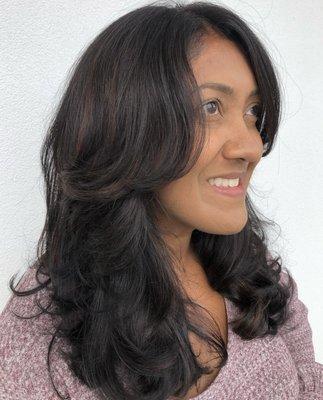 Warm highlights add so much dimension to this brunette!