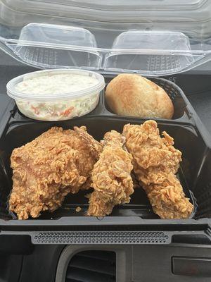 Three piece  fried chicken dinner with roll and cole slaw...