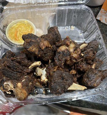 Burnt inedible Fried Goat