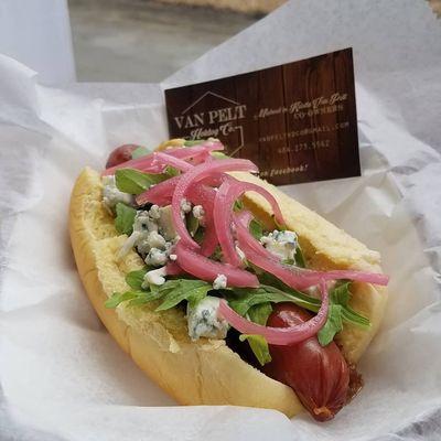 "The Jammer" pork dog with bacon bourbon jam, arugala, gorgonzola cheese, and pickled red onions