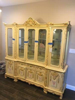 We lifted this china hutch custom made wood from phillipines it weighs about 500 plus pounds