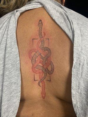 Snake spine tattoo