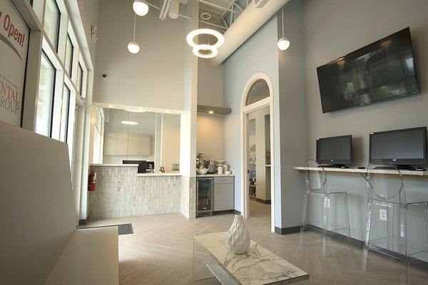 Waiting area and patient desk at dentist Wilmington NC O2 Dental Group