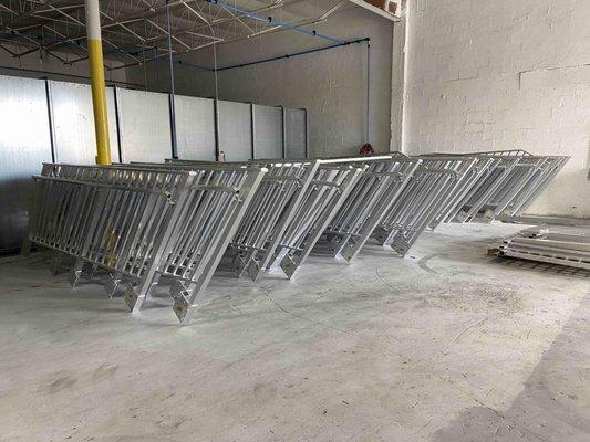 Fence railings and balcony railings for powder coating at Patriot Powder Coating in Miami, FL.