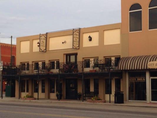 A view of la ville inn from across the street.