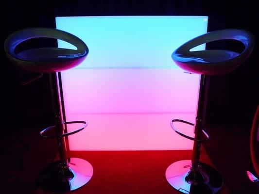 We rent acrylic LED bars, highboys and cocktail tables.