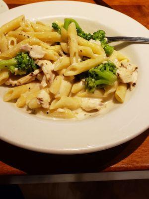 Penne pasta with chicken, broccoli and Alfredo.