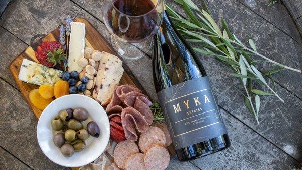 Delicious charcuterie boards and Pinot Noir.