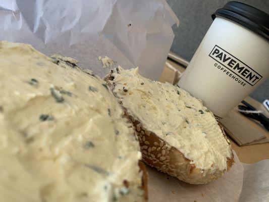 Toasted sesame bagel with garlic cream cheese and a coffee my way. Delicious Friday treat