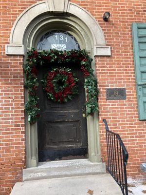 cool old door with wreathe