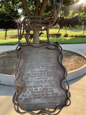 Coyote statue and poem