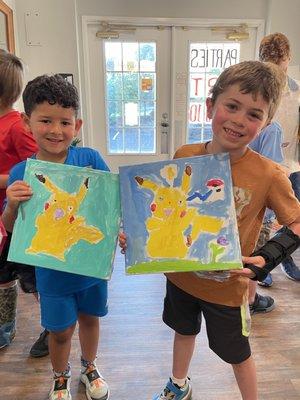 Kids and their Pikachu paintings