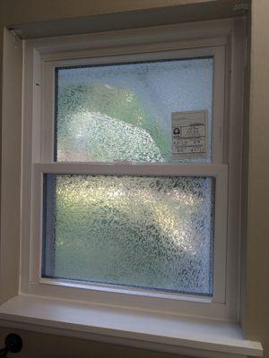 Bathroom window with privacy glass