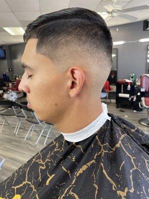 Mid fade scissors on top