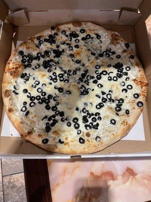 White pizza with black olives added. So good!