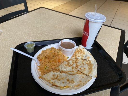 Pork Quesadilla meal. Comes with a side of refried beans and rice, as well as a drink!