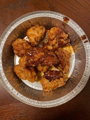 Honey BBQ boneless chicken wings with almost no sauce.