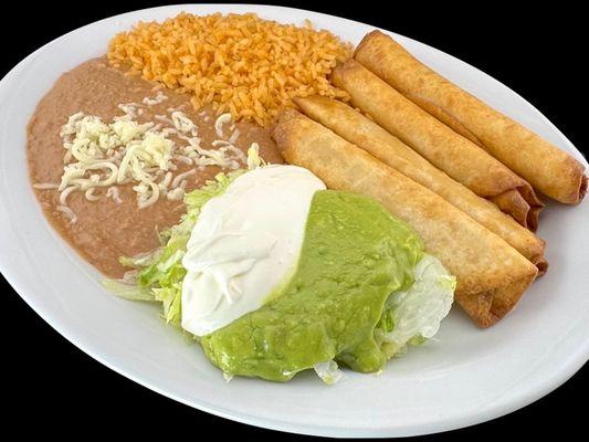 4 flautas plate. Refried beans and Mexican rice, served with fresh crispy lettuce , guacamole, sour cream