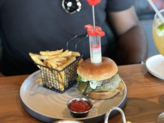 Mexican "All Wagyu" Burger w/ avocado, grilled jalapeño pepper, w/ white queso in a syringe!