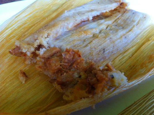 Tamales -- after unwrapping. Thinner and longer than others we've tried, with a great balance of masa to filling. Delicious!