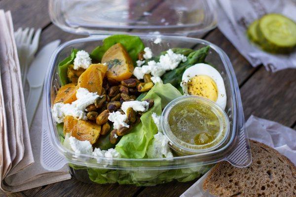 Bibb & Beet Salad- Bibb lettuce, yellow beets, asparagus, goat cheese, pistachios with lemon zest, hard boiled egg, & lemon dill vinaigrette