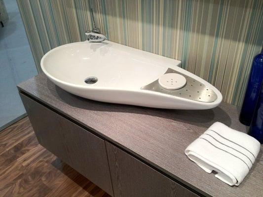 We have this curvaceous sink on display. It was on display at the 2012 Dwell Expo. GREAT for a powder room