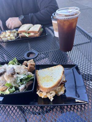 Crab meat grilled cheese, Caesar salad, tuna salad sandwich, cold brew, hot coffee