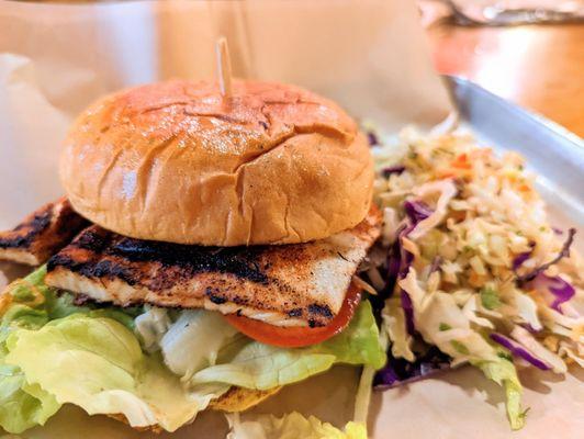 Cajun sandwich on soft Hawaiian bun with seasurf cole slaw