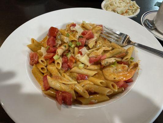 New Orleans seafood over penne pasta