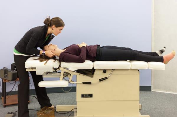 Dr. Megan Thoma working with a patient at UHI.
Photo by Aga Furtak