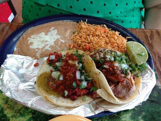 Tacos - al pastor and carnitas.  Beans and rice are very tasty