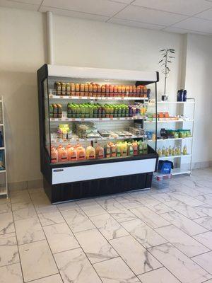 The offerings of fresh juices, detox beverage, and fresh salads.