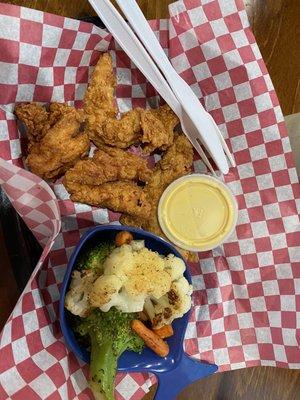 Chicken fingers and steamed veggies