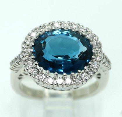 Gorgeous diamond and topaz ring