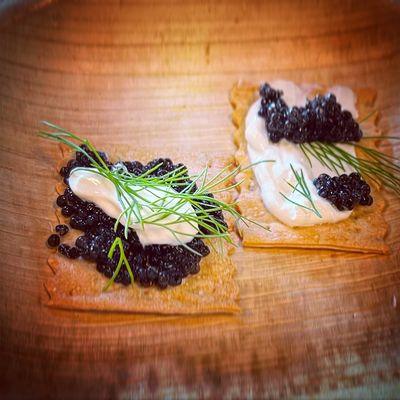 Calvisius Caviar, baby dill, Clover sour cream and Rustic Bakery's  rosemary and olive oil crackers. Simple and delicious.