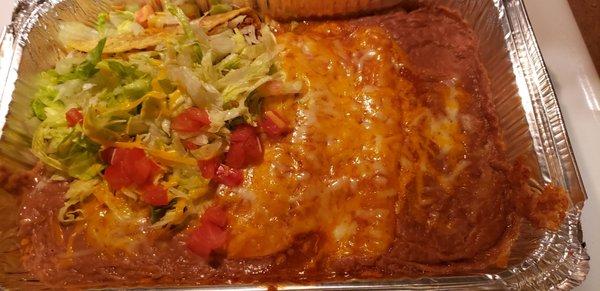 2 enchilada 1 taco beans only. Very good and delivered warm.