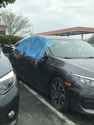 A Honda Civic waiting to be repaired