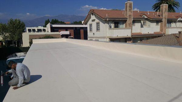 FLAT roof project recently completed - white T24 "cool roof" torch down - VERY energy saving and insulating!