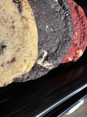 Red velvet cookie, cookies & cream cookie, and domino cookie