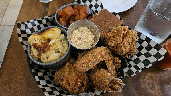 4 piece meal with cornbread, Mac and cheese, candied yams, and hot honey butter