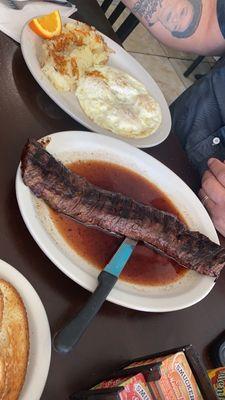 Skirt Steak breakfast with eggs, has browns and your choice of pancakes, toast or French toast.