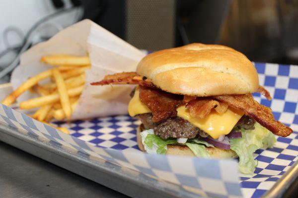 Cheeseburger with bacon and a side of fries