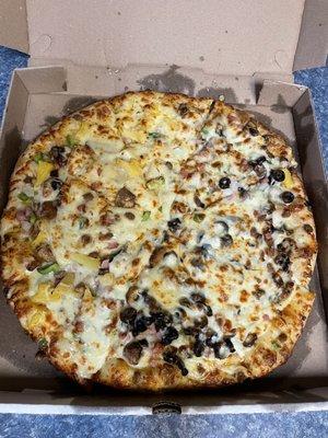 Extra cheese supreme added half pineapple and half black olives