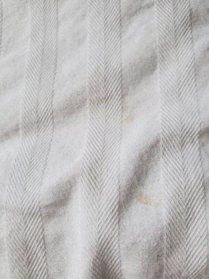 Bloodstains left on my comforter after they claimed cleaned twice.