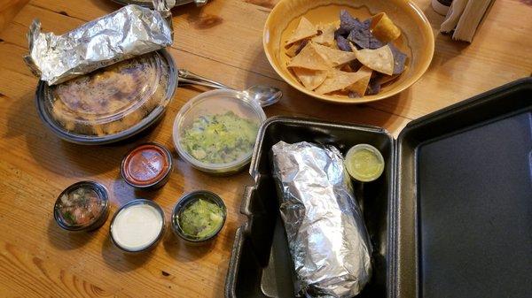 The take-out order of burrito, fajitas, and guacamole, as removed from the bag. (The nachos came in a small bag.)