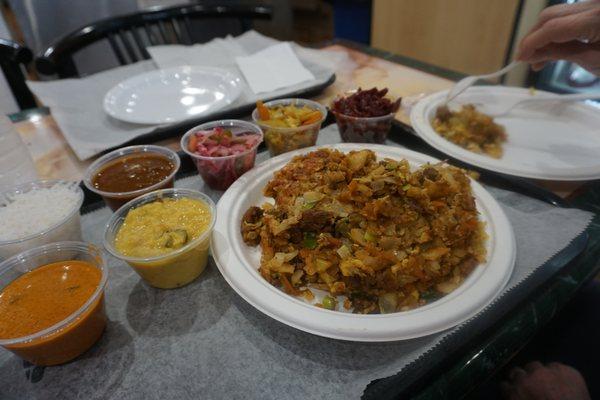 A spread with a sampling of a lot of different Sri Lankan dishes the owner assembled for us.