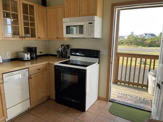 Kitchen with front entry door roadside