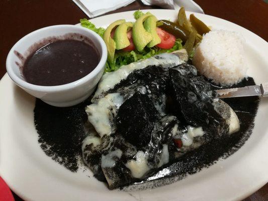 Black chicken enchiladas plate (~$16).