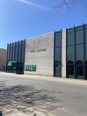 Here is our building entrance off Cooper Street. Come in the door under the green awning, then down the hall to Suite 111.